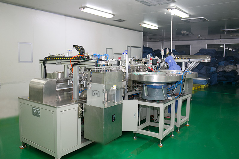 Disposable double-wing infusion needle assembly machine